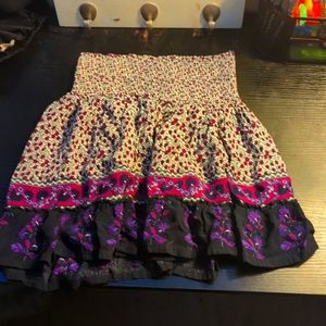 White and black skirt with purple floral design